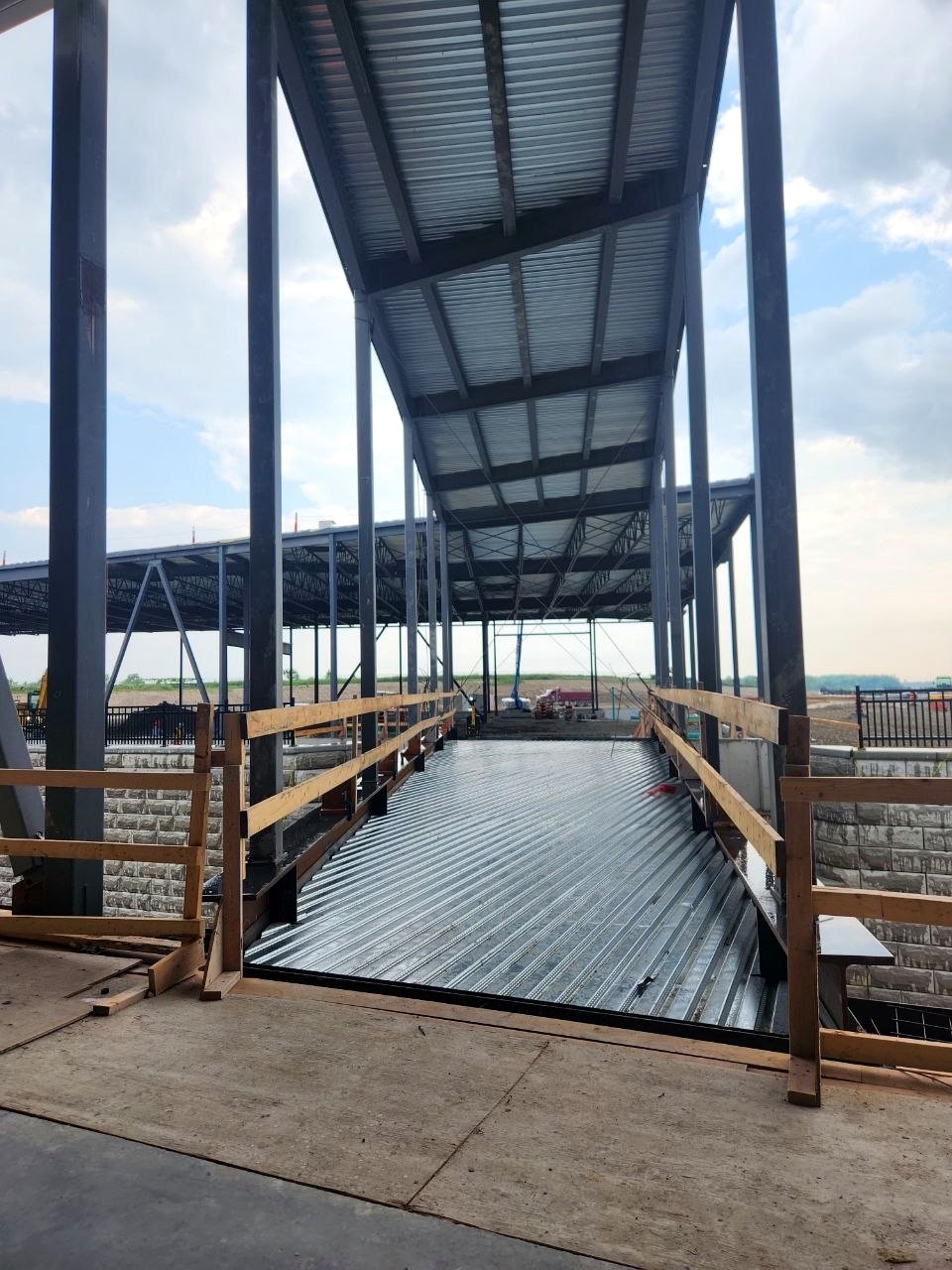 Covered steel commercial structure